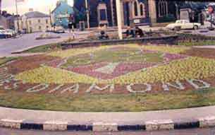 Flowerbed in front of St. Mark's celebrating the Girl Guide Diamond Jubilee