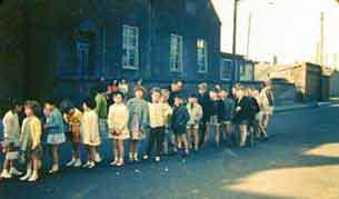 Children leaving Park Road Sunday School on the way to the railway station for their annual excursion